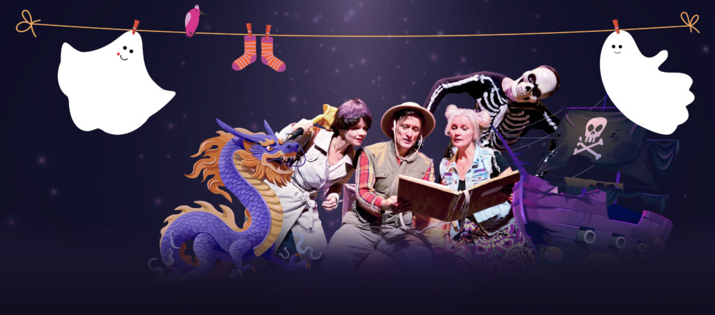 Tarja Luoma, Matti Tegelman ja Ulla Piispanen lukevat kirjaa, taustalla luuranko ja kummituksia.